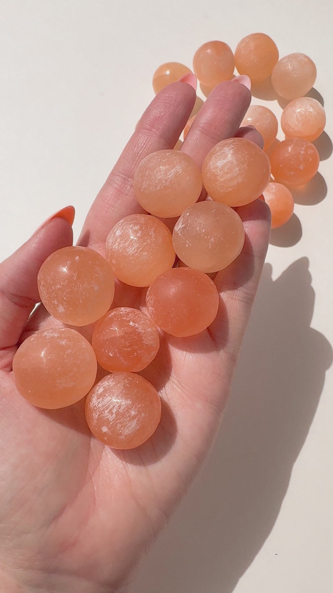 Peach Selenite Sphere // Protection + Insight + Flexibility